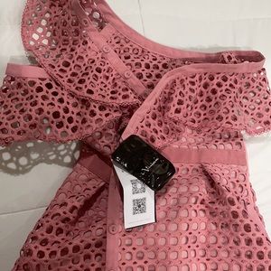 Off shoulder crochet dress. Has pockets. Lined. Runs small. Fits like a 6